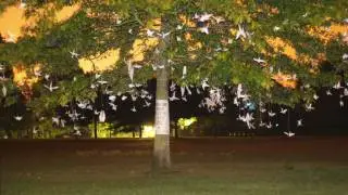 1,000 origami birds nest in a tree