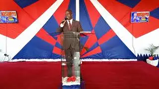 Senior Bishop George Ochieng singing 