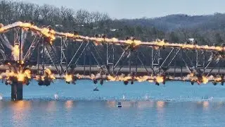 Hundreds watch as MoDOT continues demolition work on the Long Creek Bridge over Table Rock Lake