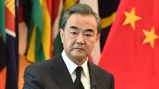 Wang Yi exchanges views with Japanese, British FMs over Korean Peninsula