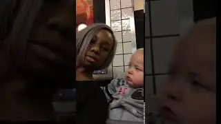 Baby Stares At Black Woman Then Smirks