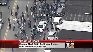 Violent Showdown Unfolds On The Streets Of Baltimore