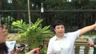 Ms Tan explains the function of a vegetation buffer