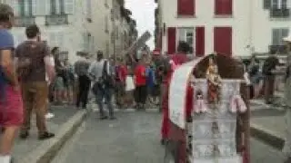Protesters rally against Macron near G7 summit