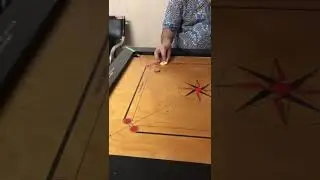 MY 9 GRIP IN GAME OF CARROM