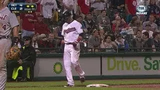 Nick Swisher takes a dive rounding third base in the 10th inning