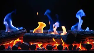 Quiet Dark Fireplace - Blue and Amber Flames Flowing Gently Across Burning Logs in a Dark Fireplace