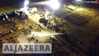 North Dakota Protesters Blasted with Water Cannons
