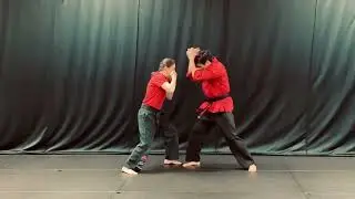Smothering Bear A (Defense: Bear Hug from Front, Arms Pinned)