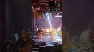 Uncle of Cheondung is performing music in a concert near Hong Dae Univ.
