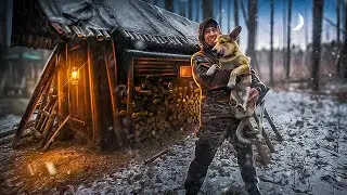 Overnight stay in a log cabin with a dog. It's cozy and warm inside. Cooking.