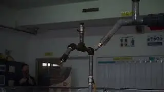 Rig Deluge Free Flow Adaptor - Spray pattern with debris at the nozzle