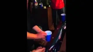 Drunk dude trying to play flippy cup