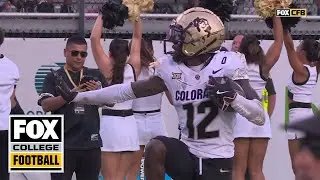 Colorado's Travis Hunter hauls in an UNREAL interception, strikes Heisman pose