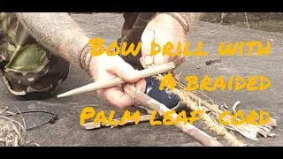 Bow drill with a braided palm leaf cord.