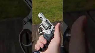 Taurus Model 605 Defender in .357 Magnum at the range, close up. 4K