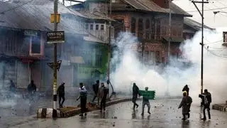 India imposes Kashmir curfew after protesters die in firing