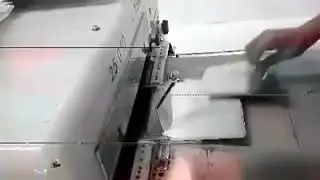 Automatic pocket iron/press machine in Bangladesh garments industry.