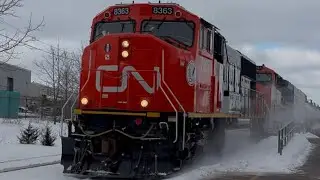 CN A421 with brand new SD75IACC leader passing through St Cathrine&rsquo;s station 