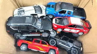 Box Full of Model Cars -Mazda Mx5, Koenigesgg Jesko, Lamborghini Scv12, Byd Yang Wang U8, Toyota Car