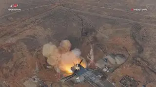 A U.S.-Russian crew of Blasts Off  Space Station In a Soyuz Space Craft