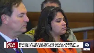 District Attorney plants tree, presents award in memory of child abuse victim
