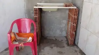 Passando a seladora, preparando a parede para pintura