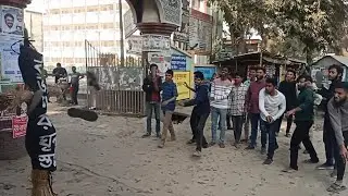 Throwing shoes at Razakar hate monument