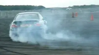 bmw M3 drrifting on the track