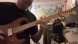 Cover on Ronni Le Tekr&oslash;&rsquo;s (TNT) solo on the song Tell No Tales