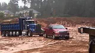 Ford f150 pulling out in the mud a stuck dump truck !!!