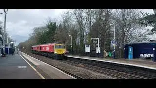 Pair of Sheds. 66719 & 66128 running light through Warwick 