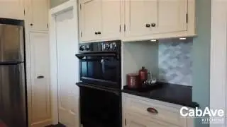 CabAve Designed Cream Lake House Kitchen with Sapele Wood Countertops