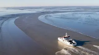 Pier Holwerd 19 nov. Oerd bij eb richting Nes Ameland