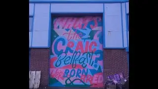 Что за безумие? Часто используемая фраза из Северной Ирландии, нарисованная на бизнес-парке Рейве...