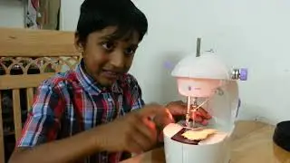 Ninju explaining new tailoring machine