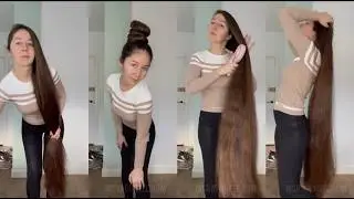 MsRapunzel | Brunette Rapunzel poses with knee length hair at home