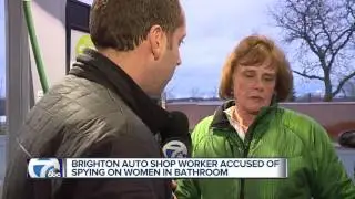 Brighton auto shop worker accused of spying on women in bathroom