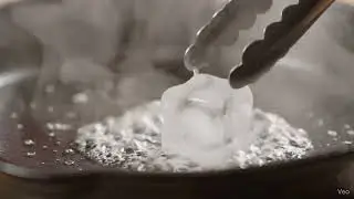 Ice Cube Sizzles on Hot Skillet