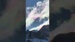 4036: Auspicious skies: Dragon-shaped rainbow cloud graces Changbai Mountain in China