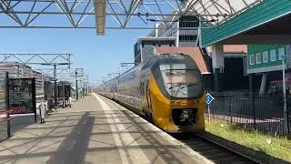Double-decker train departing from Zaandam station in the Netherlands.