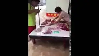 The meat stall still running in the flood