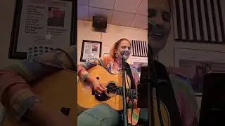 Ilene Springer sings  and plays guitar.   