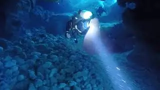 Cave travel with INNOBEAM waterproof flashlight and video light