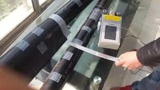 Large White Color Datamatrix Code Hand Printing on Steel Tube_Portable inkjet printer_mobile printer