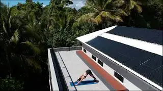 Yoga on The Port Douglas Beach House roof deck