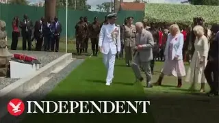 King Charles trips on fake grass at cemetery during visit to Kenya