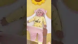 so I dressed my baby in this warm bear-shaped swaddle blanket. It's cute# shorts