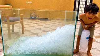 حطينا 50 كيلو ثلج بحوض السمك !!
