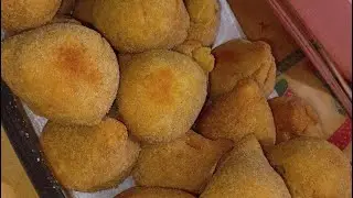 Making coxinha and teaching my granddaughter.